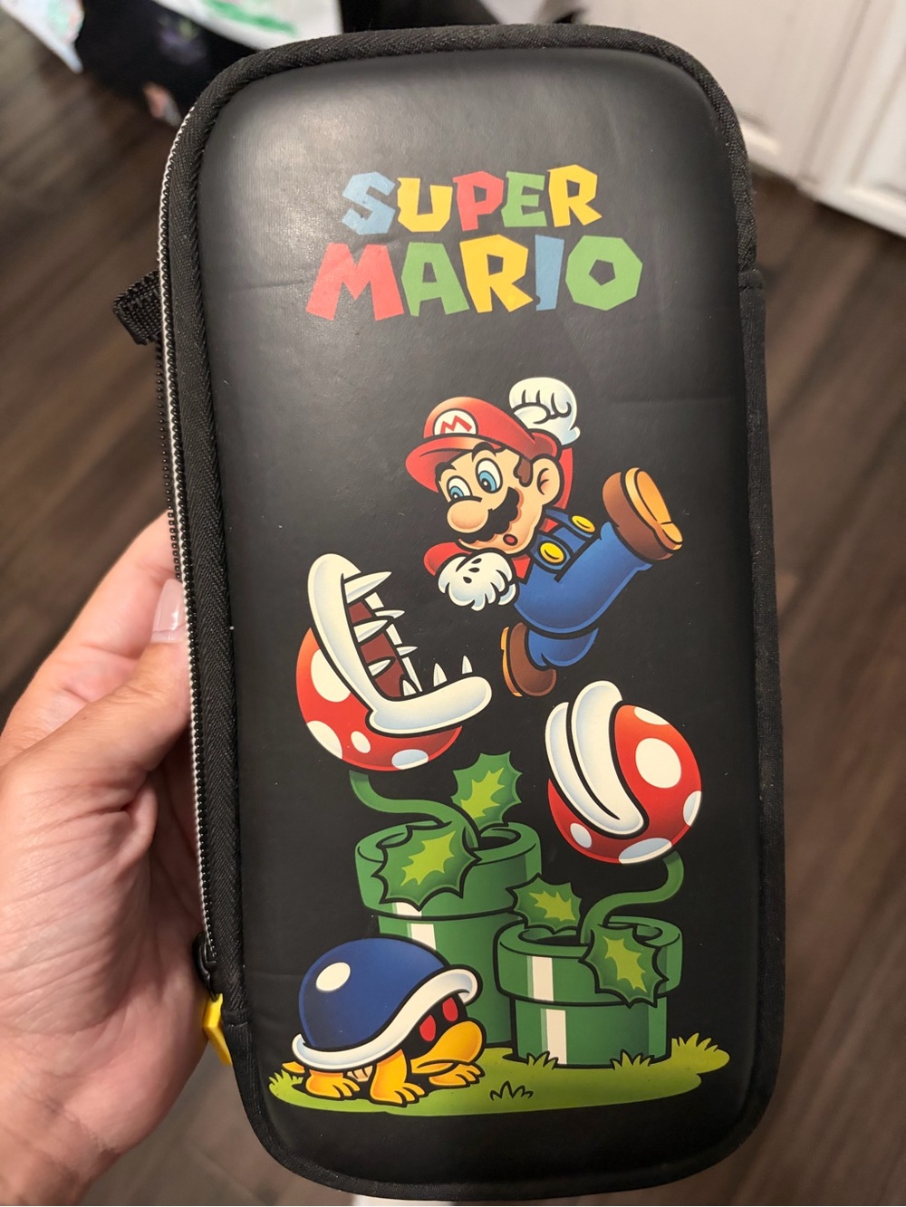 Nintendo Super Mario Black Travel Case with Colorful Character Art